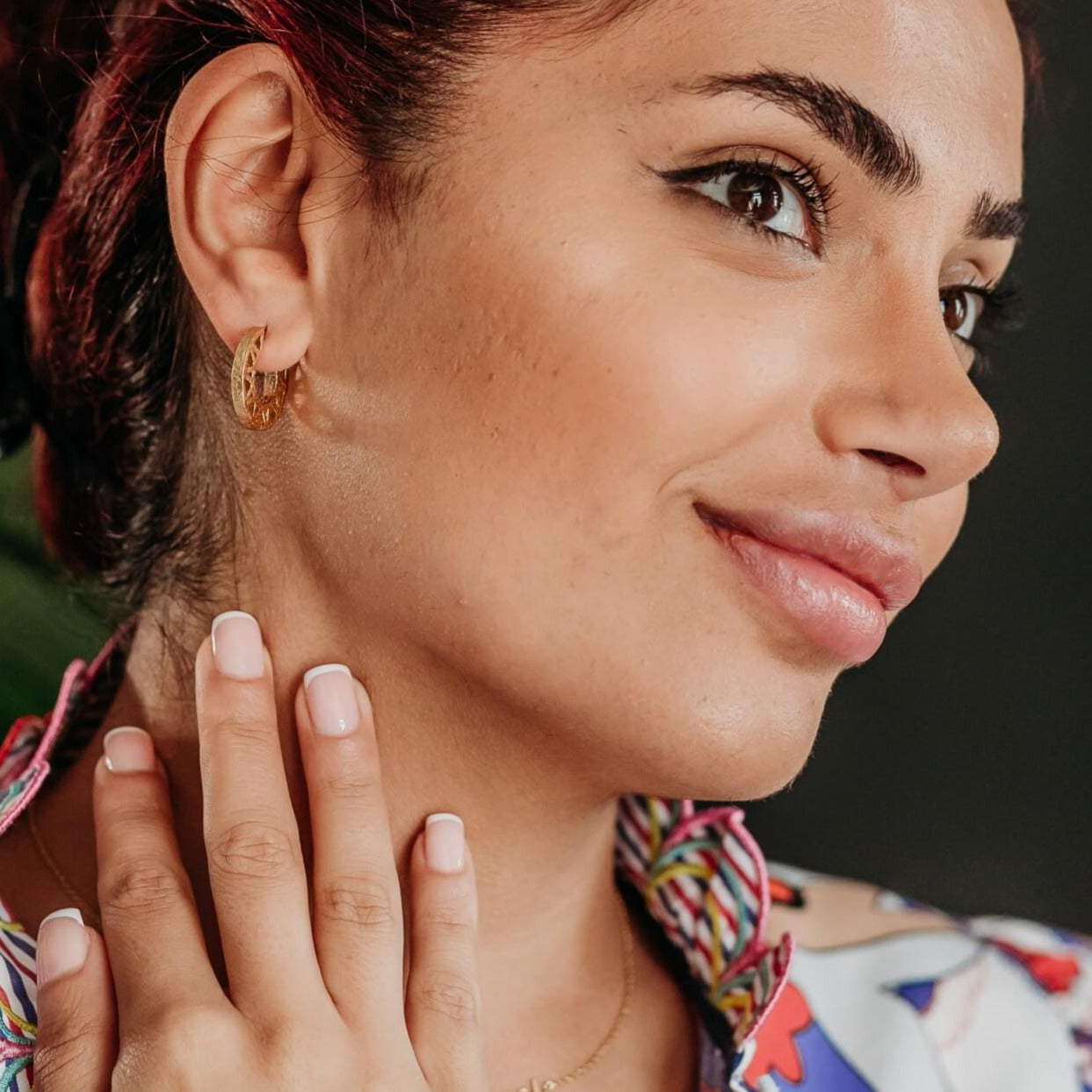 model wears 14k gold vermeil geometric statement hoop earrings