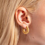 model wears Geometric Gold Vermeil Statement Hoop Earrings close up