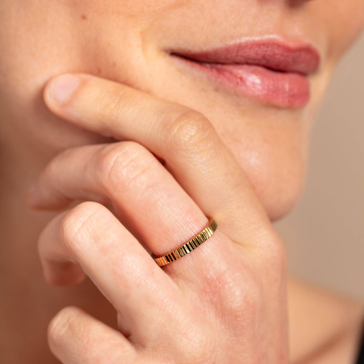 model wears Ridged Gold Stacking Ring - close up