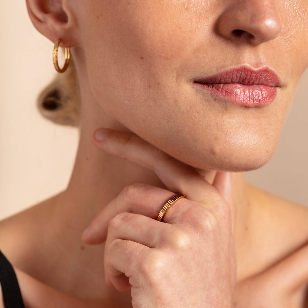 model wears Ridged Gold Stacking Ring