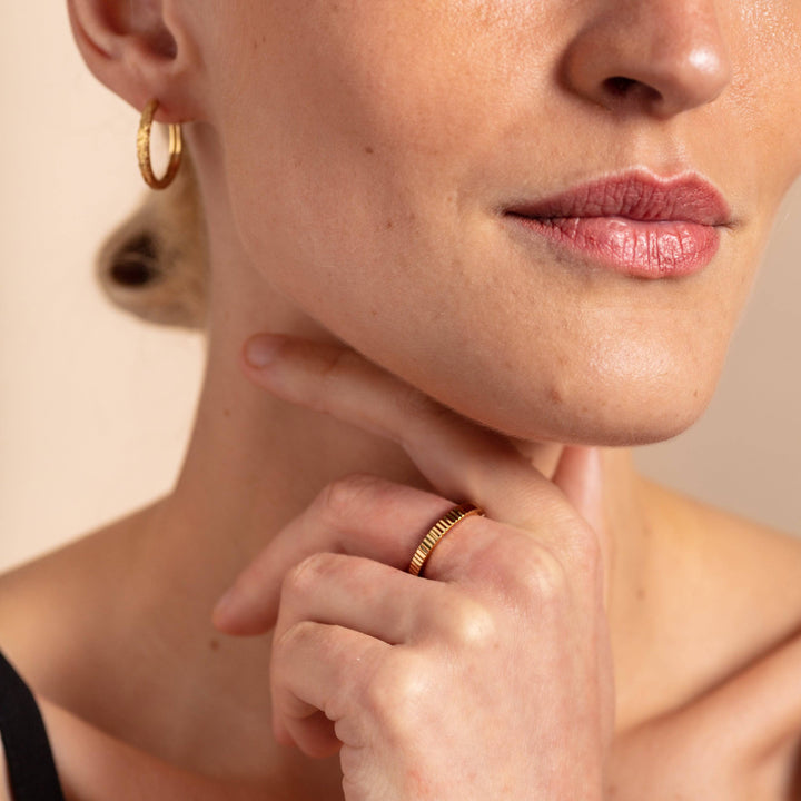 model wears Ridged Gold Stacking Ring