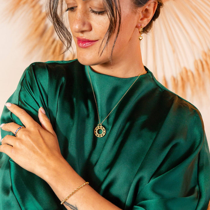 model wears Round Rolo Belcher Gold Chain Bracelet