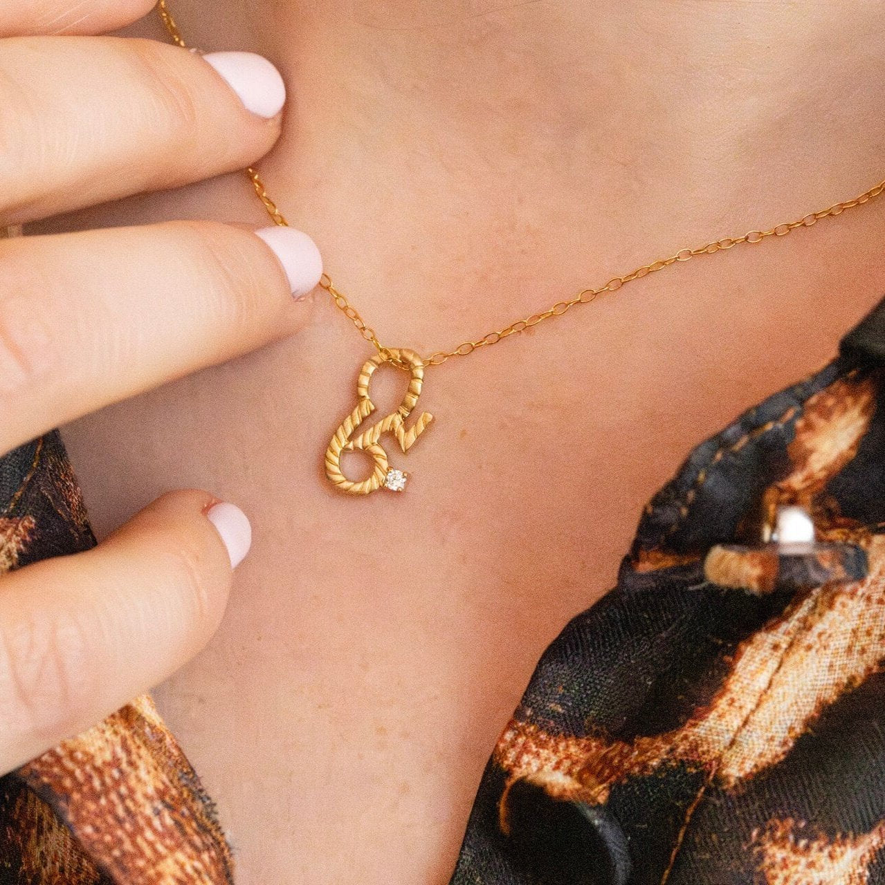 model wears Brave 14k Gold Vermeil Shorthand Charm Necklace - Claire Hill Designs