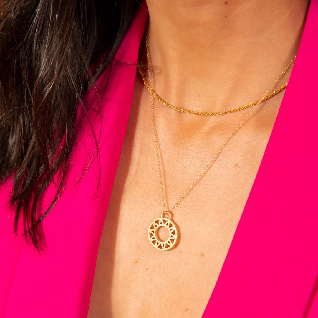 model wears Stardust Gold Layering Chain Necklace and gold vermeil geometric disc necklace