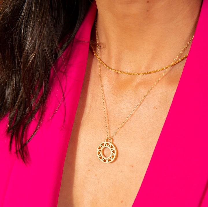 model wears Stardust Gold Layering Chain Necklace and gold vermeil geometric disc necklace