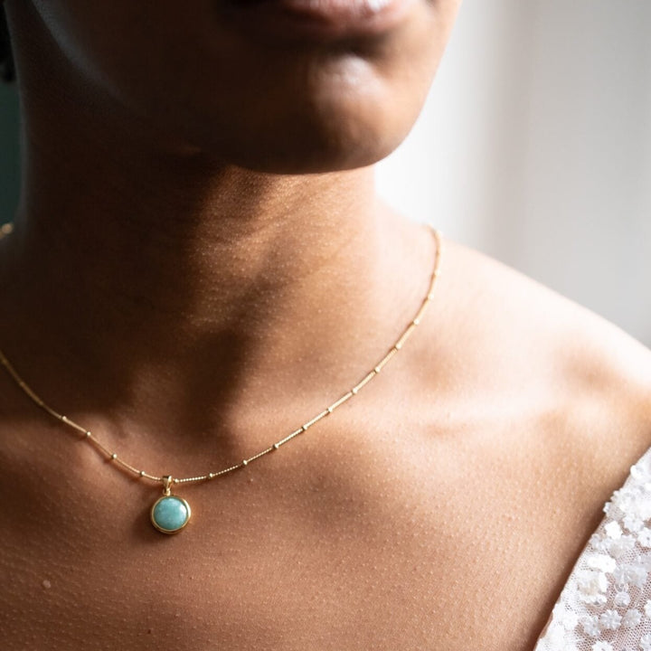 model-wears-18-gold-vermeil-amazonite-disc-necklace-claire-hill-designs-close-up