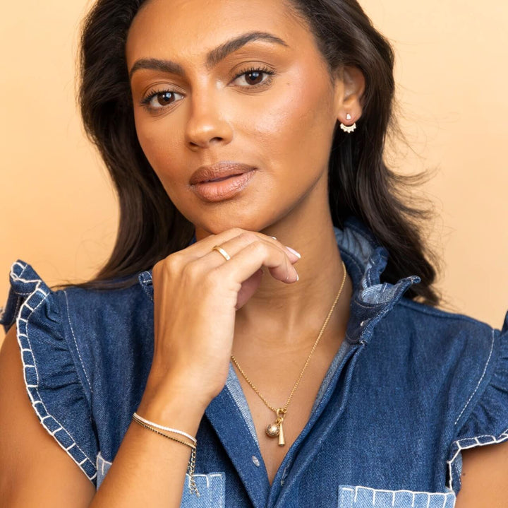 model wears Sparkly Gold Crescent Ear Jacket