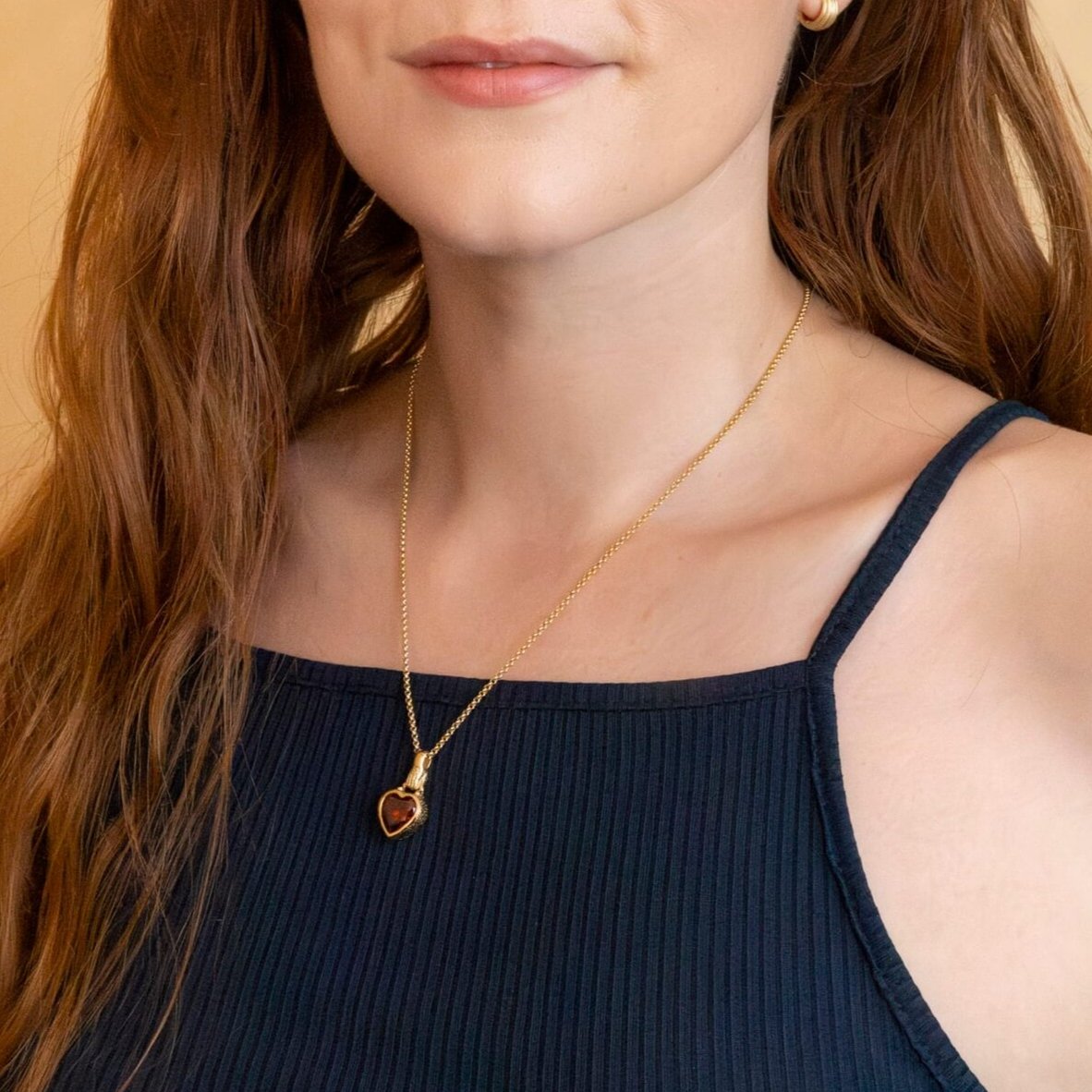 model wears 18k Gold Vermeil Hand In Heart Charm Pendant necklace- Claire Hill Designs