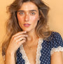 model wears 18k Gold Vermeil and Cubic Zirconia Horseshoe Charm Pendant Necklace - Claire Hill Designs