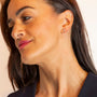 model wears Sparkly Gold Lightning Bolt Stud Earrings 