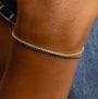 model wears 18k gold vermeil sparkly cubic zirconia tennis bracelet