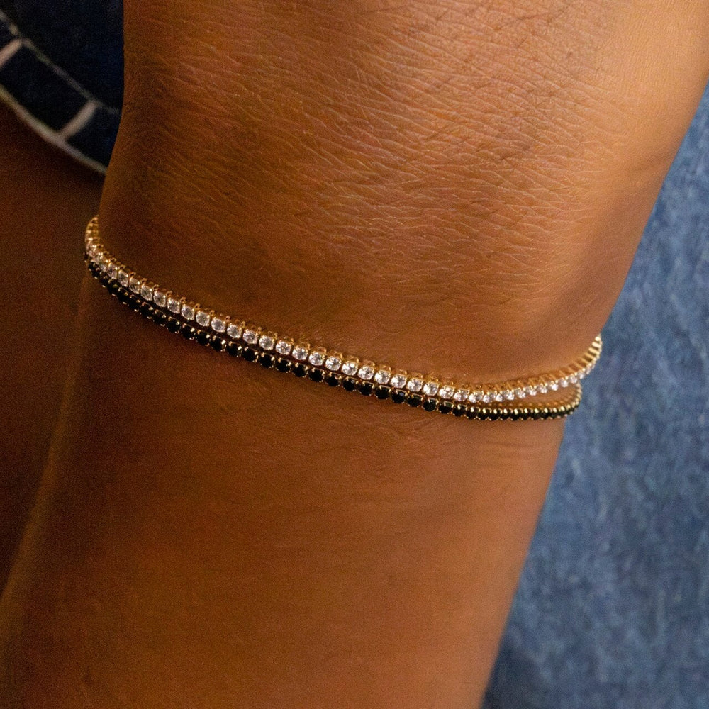 Model wears Black Cubic Zirconia Gold Tennis Bracelet