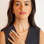 model wears Emerald Gold Vermeil baguette ring