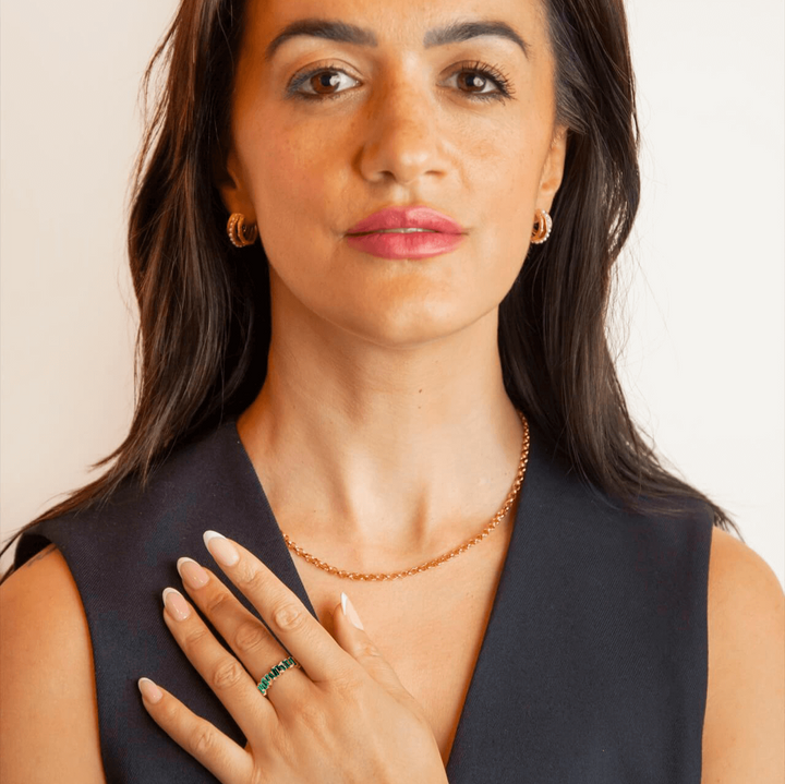 model wears Emerald Gold Vermeil baguette ring