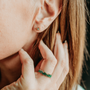 model wears Emerald Gold Vermeil baguette ring