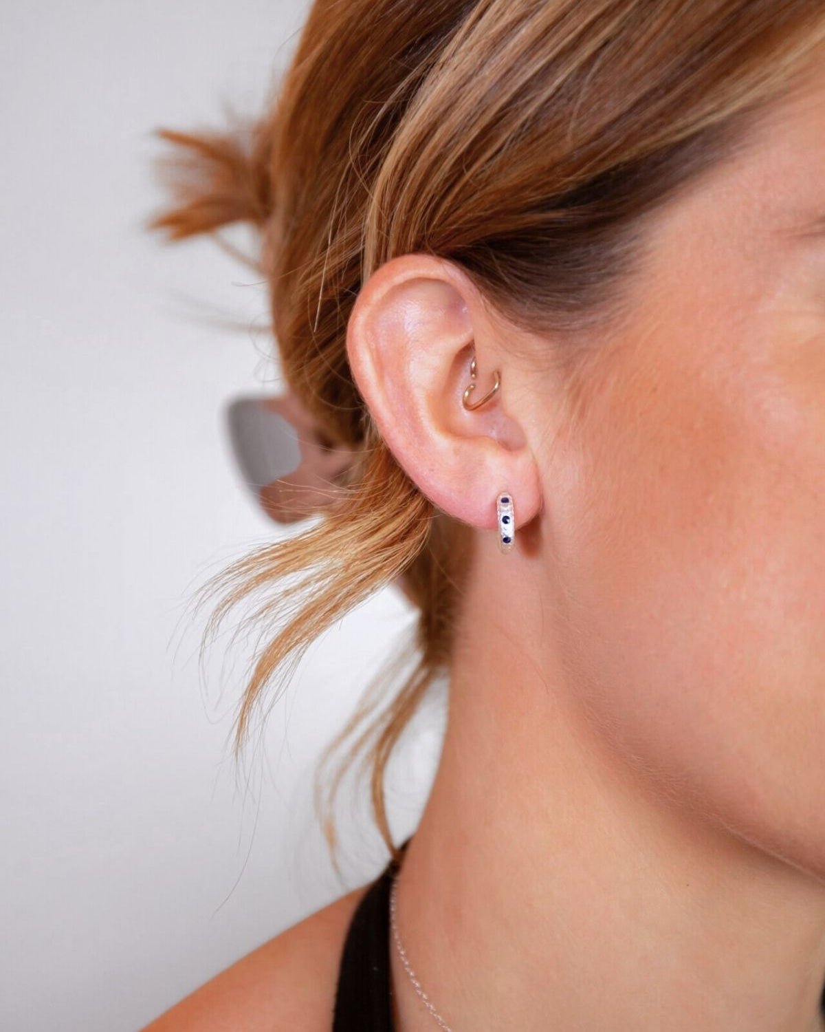 model wears Art Deco Lapis Lazuli Silver Huggie Earrings