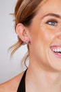 model wears Art Deco Lapis Lazuli Silver Huggie Earrings
