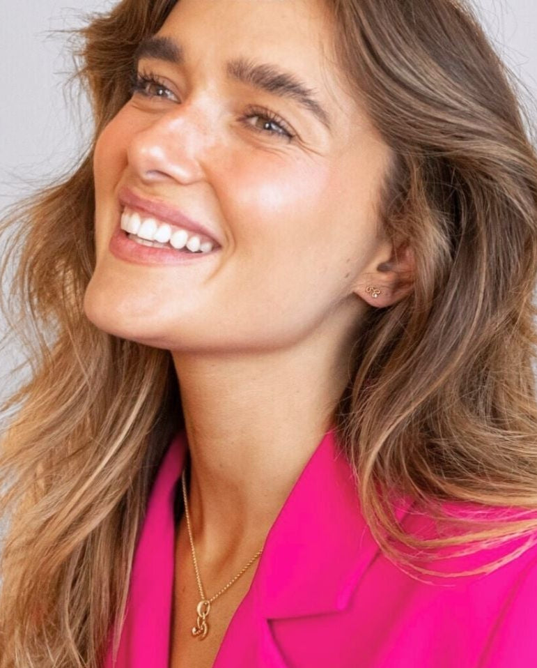 model wears Beautiful Gold Shorthand Stud Earring
