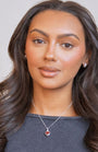 model wears Brushed Silver Chunky Huggie Hoops