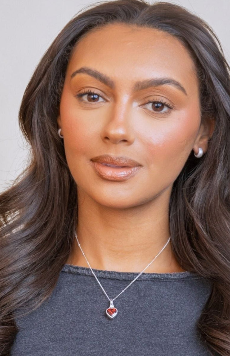 model wears Brushed Silver Chunky Huggie Hoops