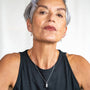 model wears Mystic Star Silver Dog Tag Necklace