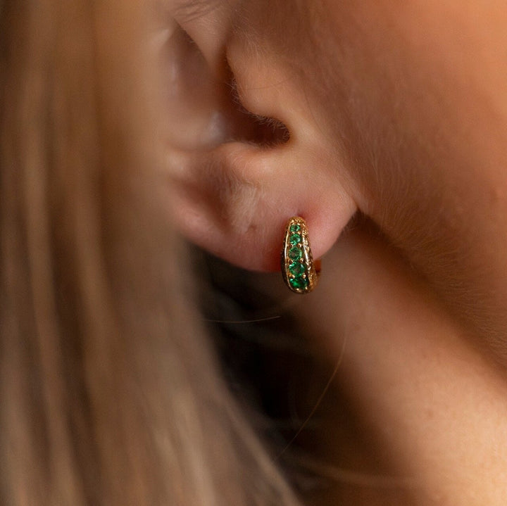 Model wears Emerald and 18k Gold Vermeil Antique Textured Huggie Hoop Earrings - Claire Hill Designs