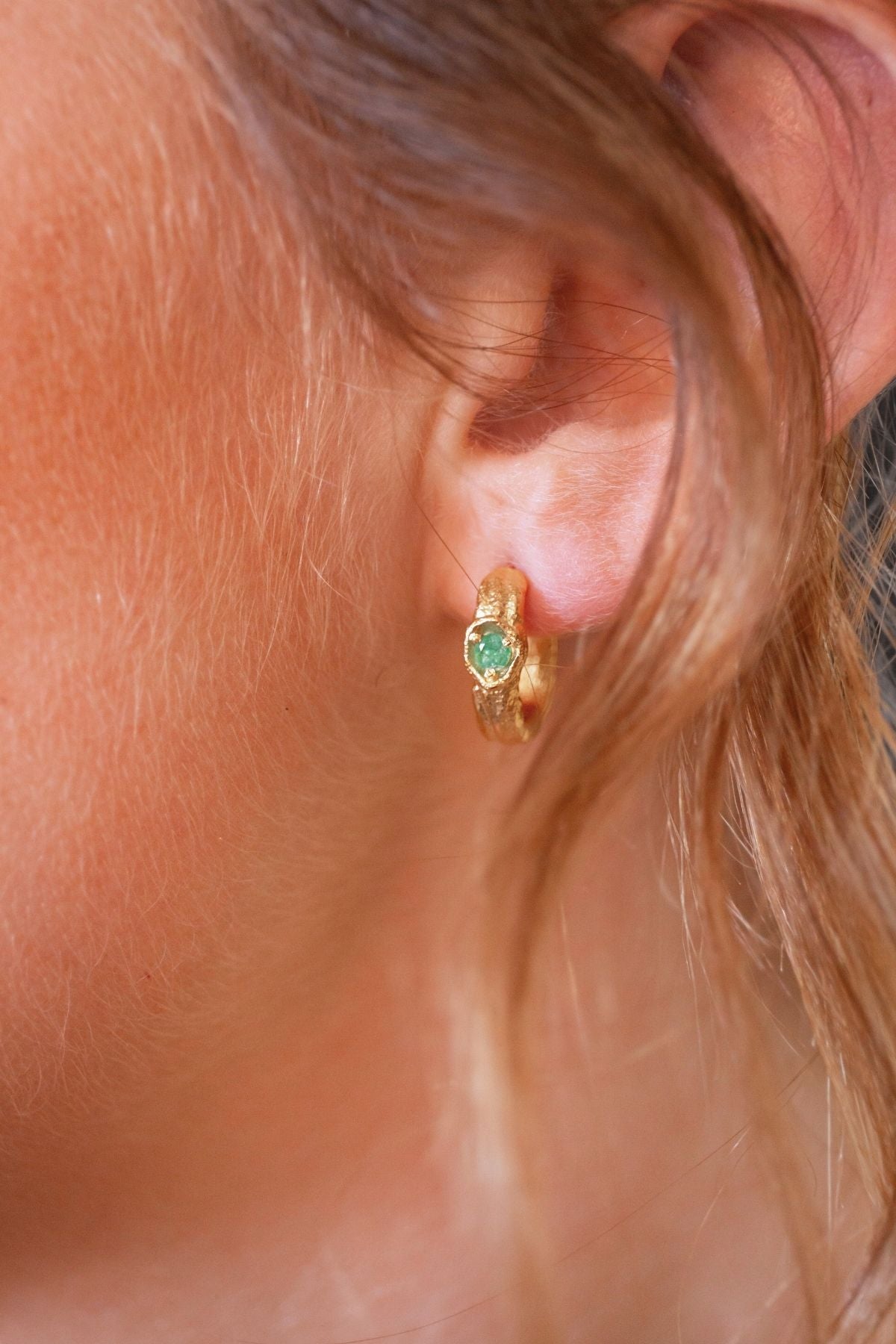 model wears Emerald Gold Branch Hoop Earrings