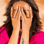 model wears enamel stacking rings