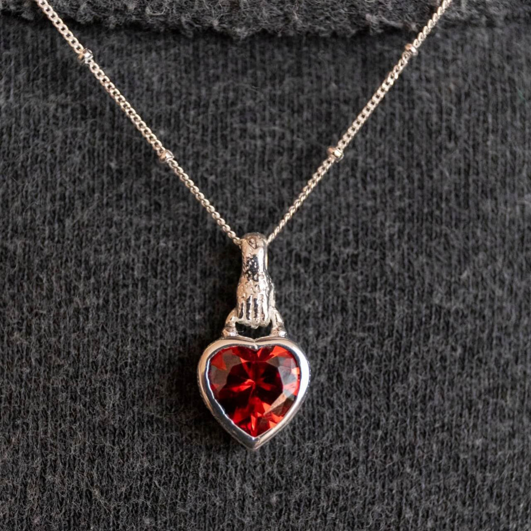 model wears Silver Hand In Heart Charm Pendant necklace- Claire Hill Designs