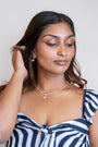 model wears Ginkgo Leaf Silver Charm Necklace