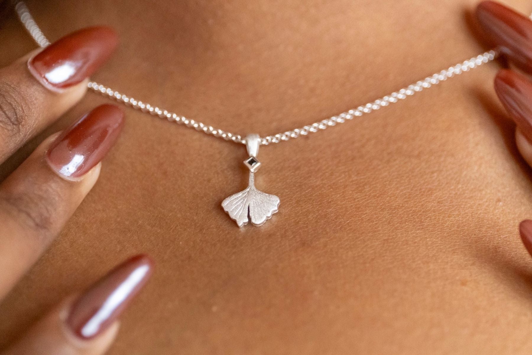 model wears Ginkgo Leaf Silver Charm Necklace - close up
