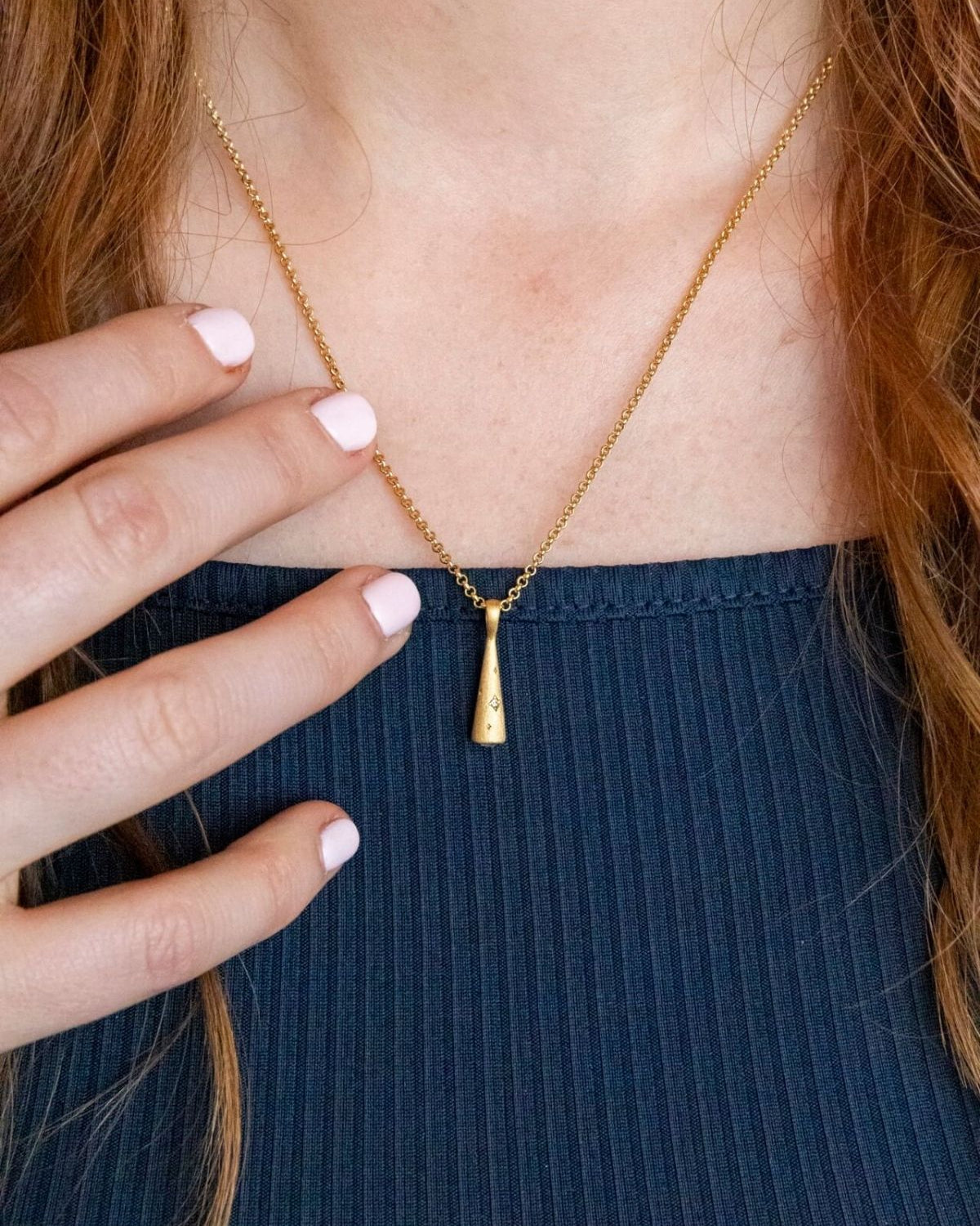 model wears Sparkly Comet Gold Charm Necklace