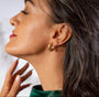model wears Geometric Gold Hoop Earrings