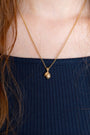 model wears Lemon Gold Charm Necklace