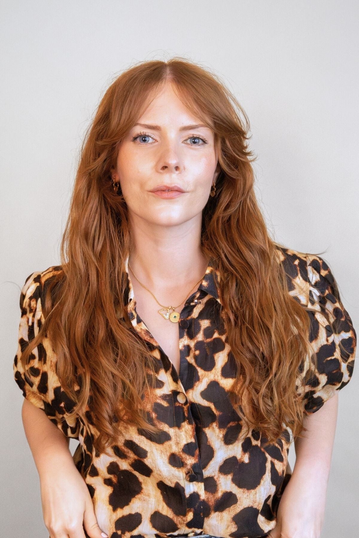 model wears Sparkly Gold Cloud Charm Necklace with lovespoon pendant and cloud earrings