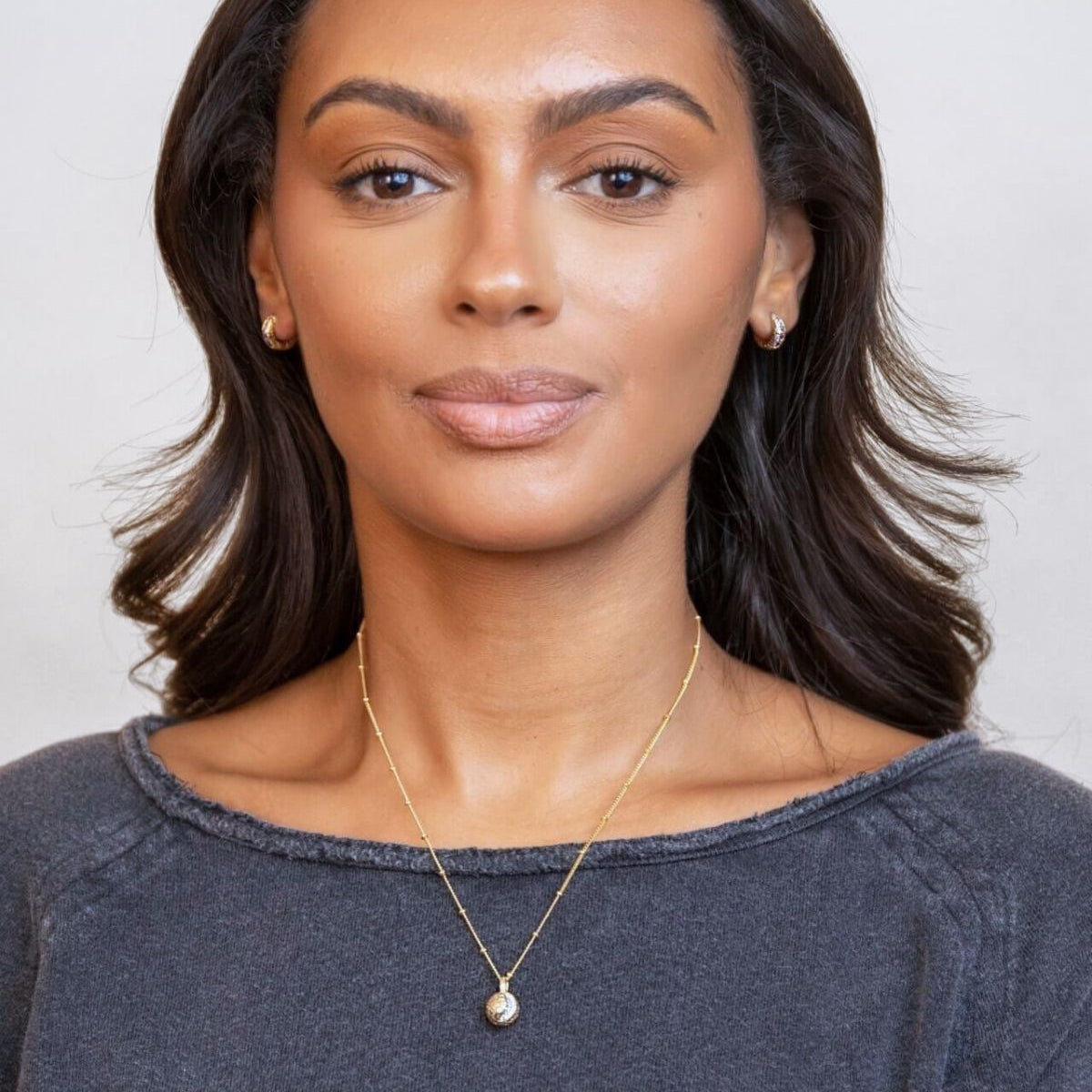 model wears Gold Moon Charm Necklace