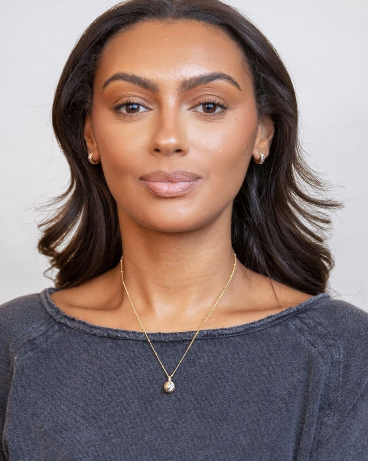 model wears Gold Moon Charm Necklace