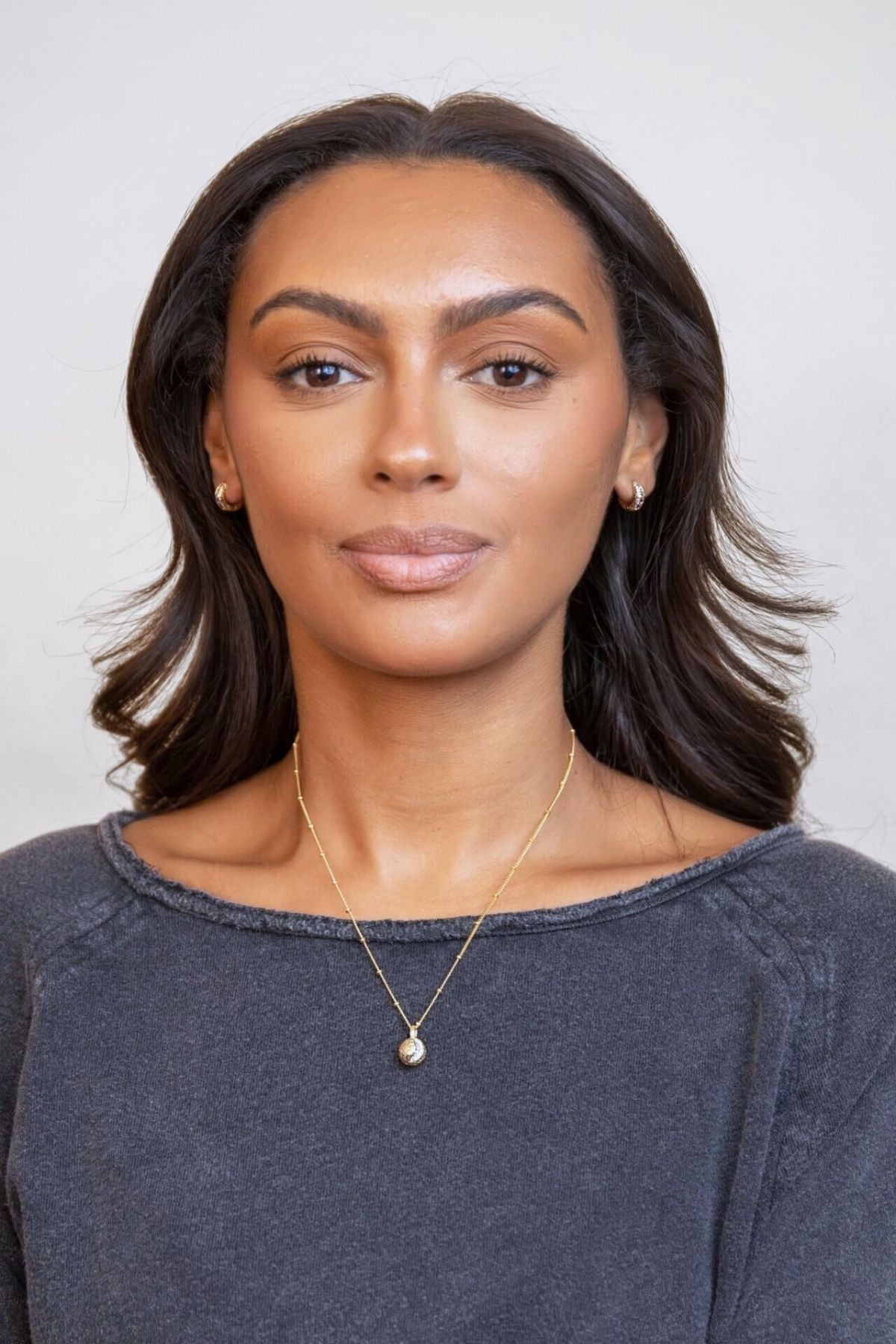model wears Gold Moon Charm Necklace