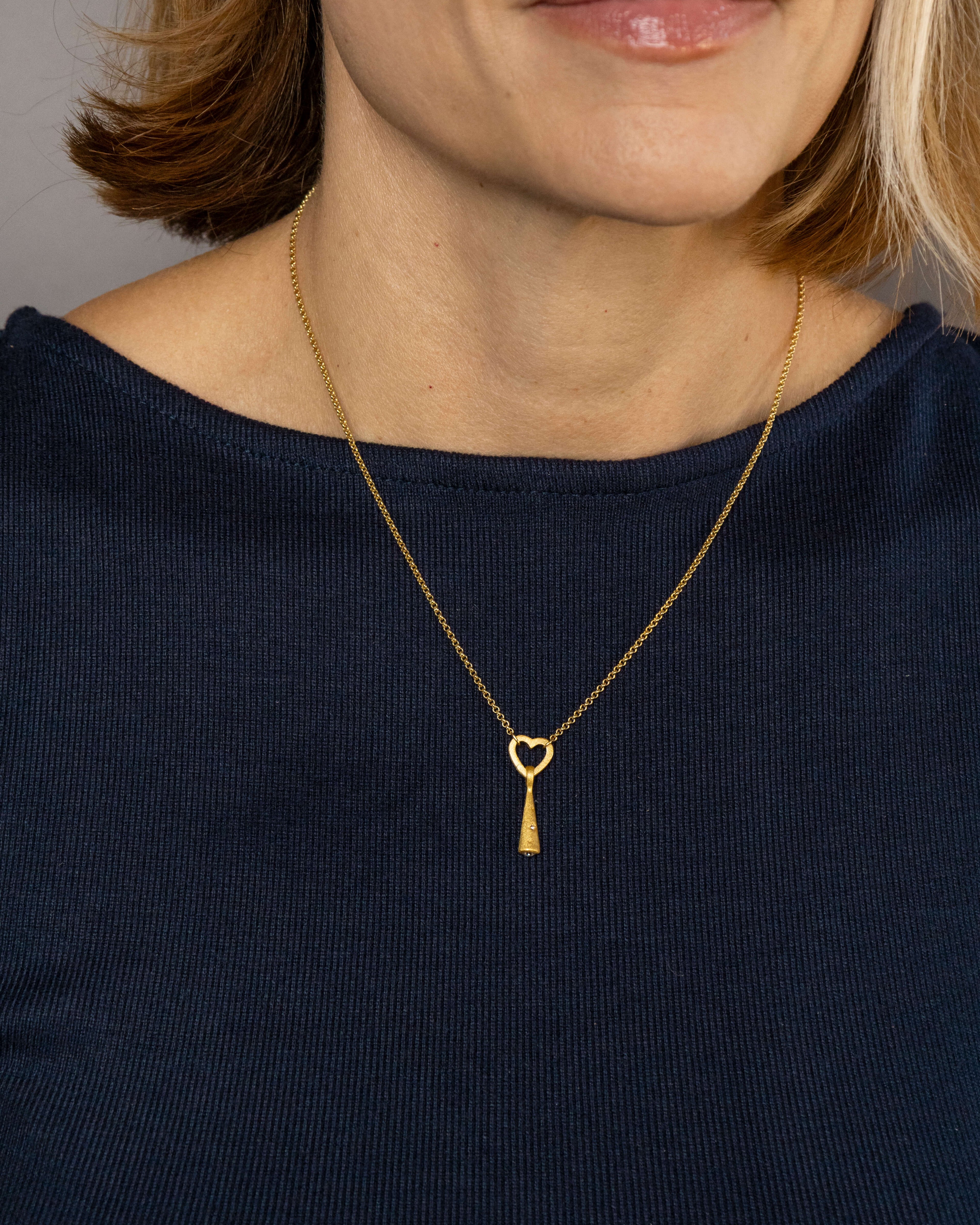 Comet on heart connector rolo necklace