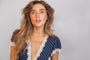 model wears Sparkly Gold Horseshoe Necklace