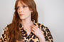 model wears Lovespoon Gold Charm Necklace