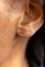 model wears Great Gold Shorthand Stud Earring
