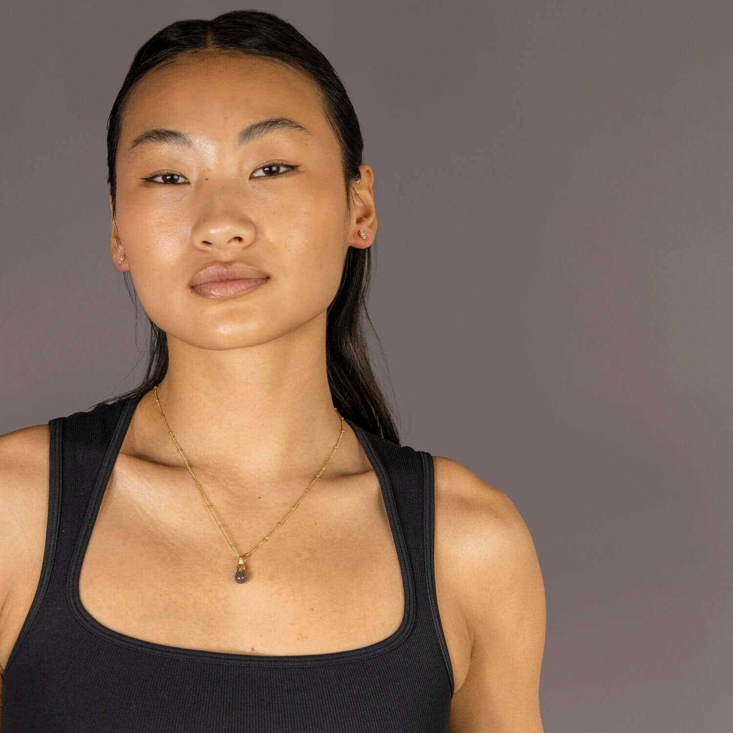 model wears -Grey Moonstone Gold Lichen Pendant Necklace on satellite chain