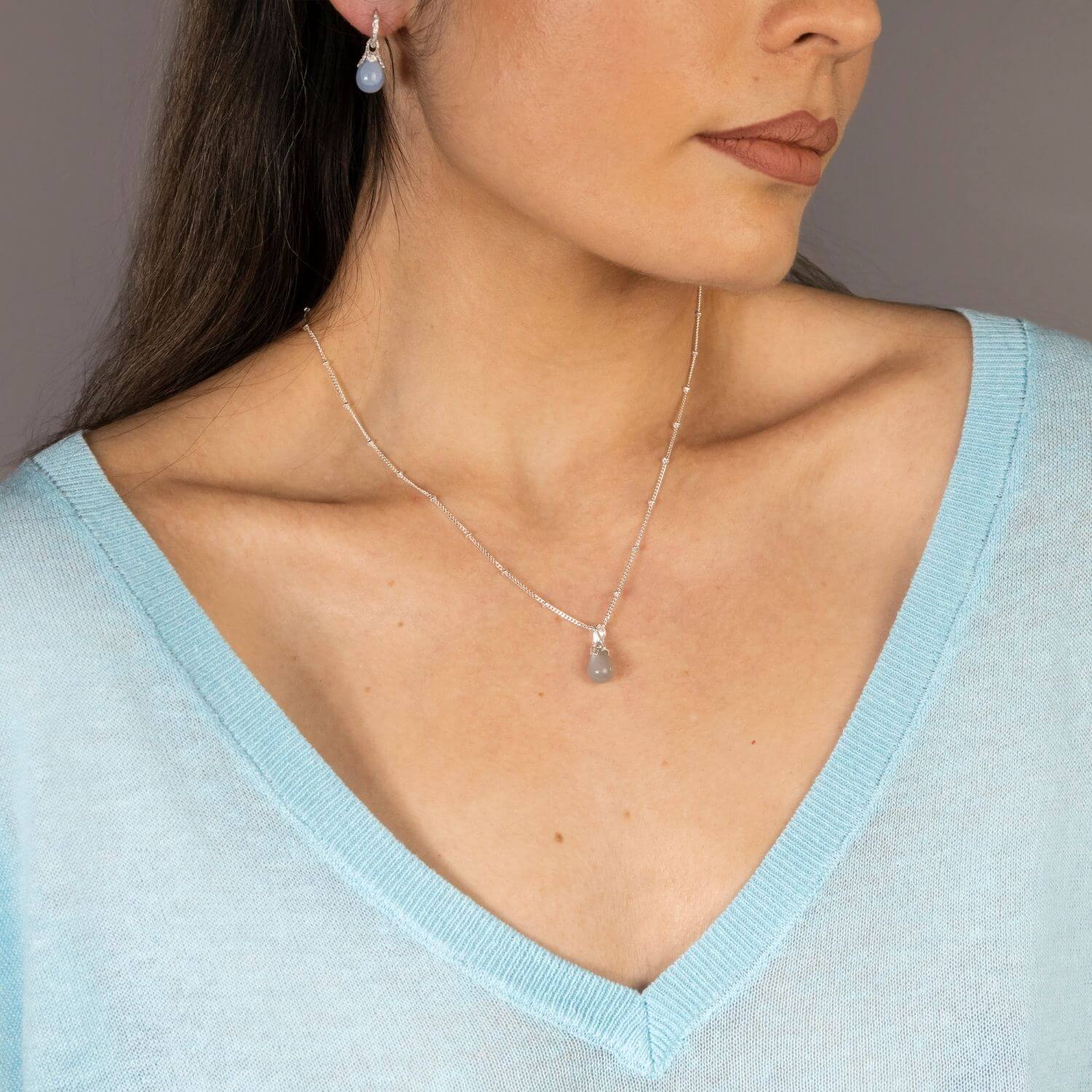 model wears Grey Moonstone Silver Lichen Pendant Necklace - satellite chain