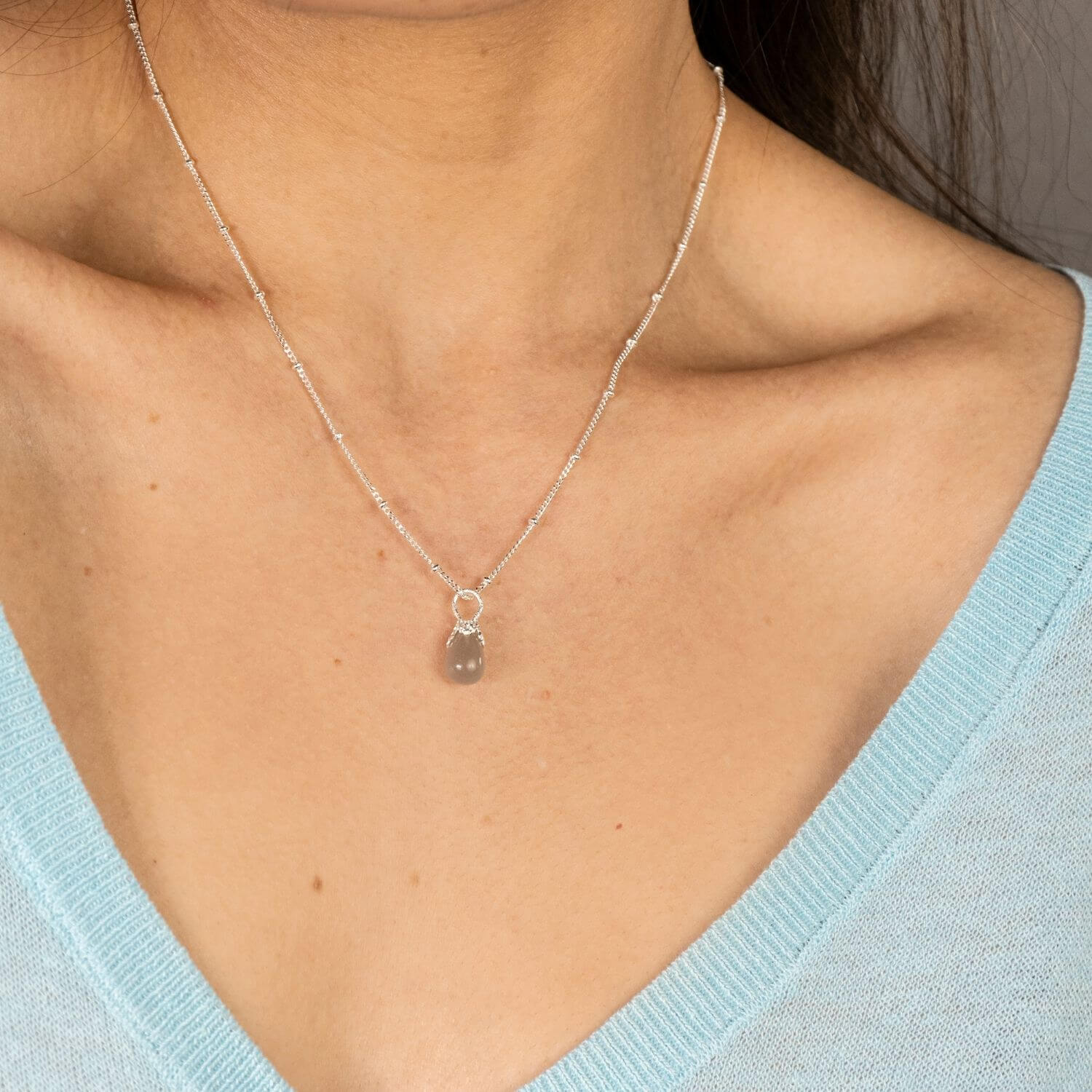 model wears Grey Moonstone Silver Lichen Pendant Necklace - satellite chain