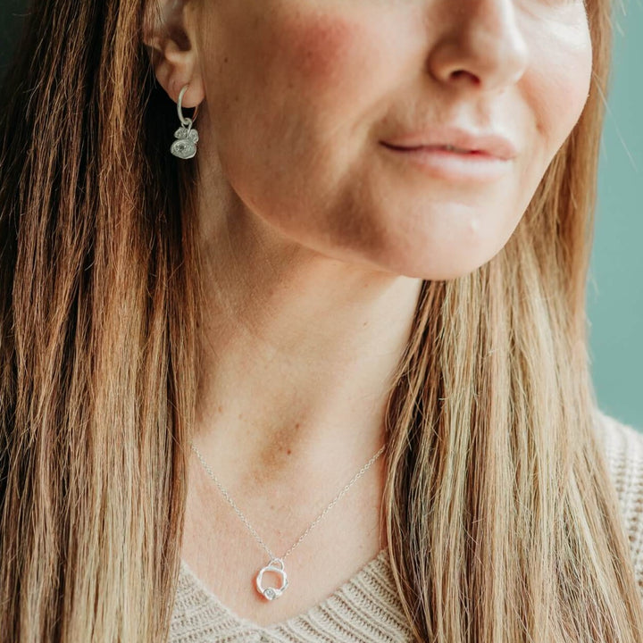 model wears Lab Grown Diamond Silver Eternity Necklace - Small  and lab grown diamond hoop earrings