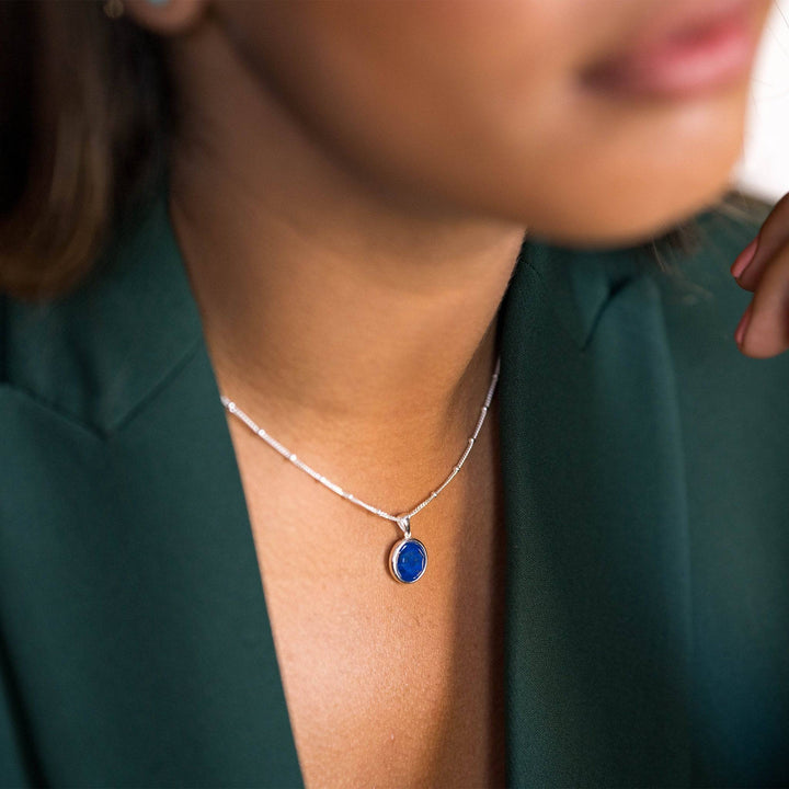 model wears Lapis Lazuli Silver Disc Necklace - close up
