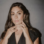 Model wears large 30mm and medium 20mm gold vermeil brushed hoop earrings