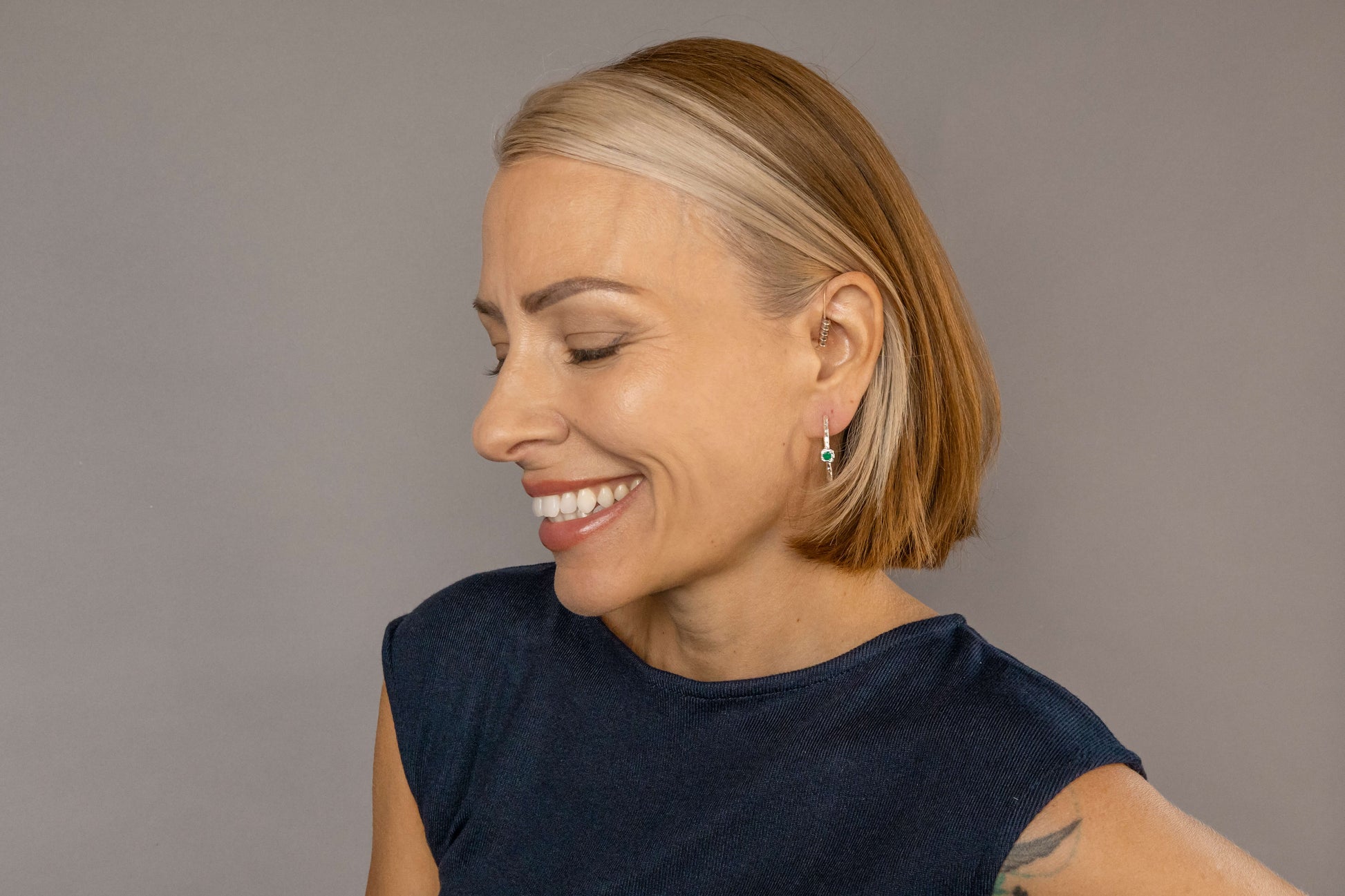 model wears Chalcedony Lichen Branch Silver Large Hoops