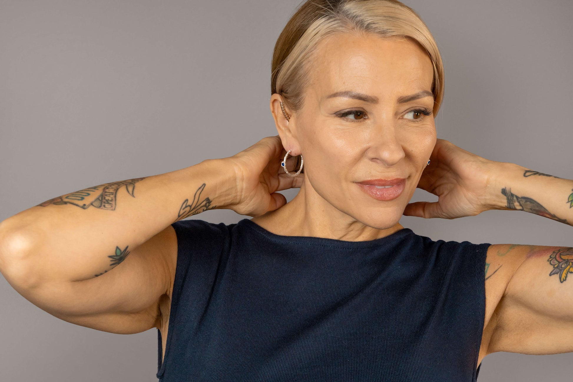 model wears Lapis Lazuli Lichen Branch Silver Large Hoops
